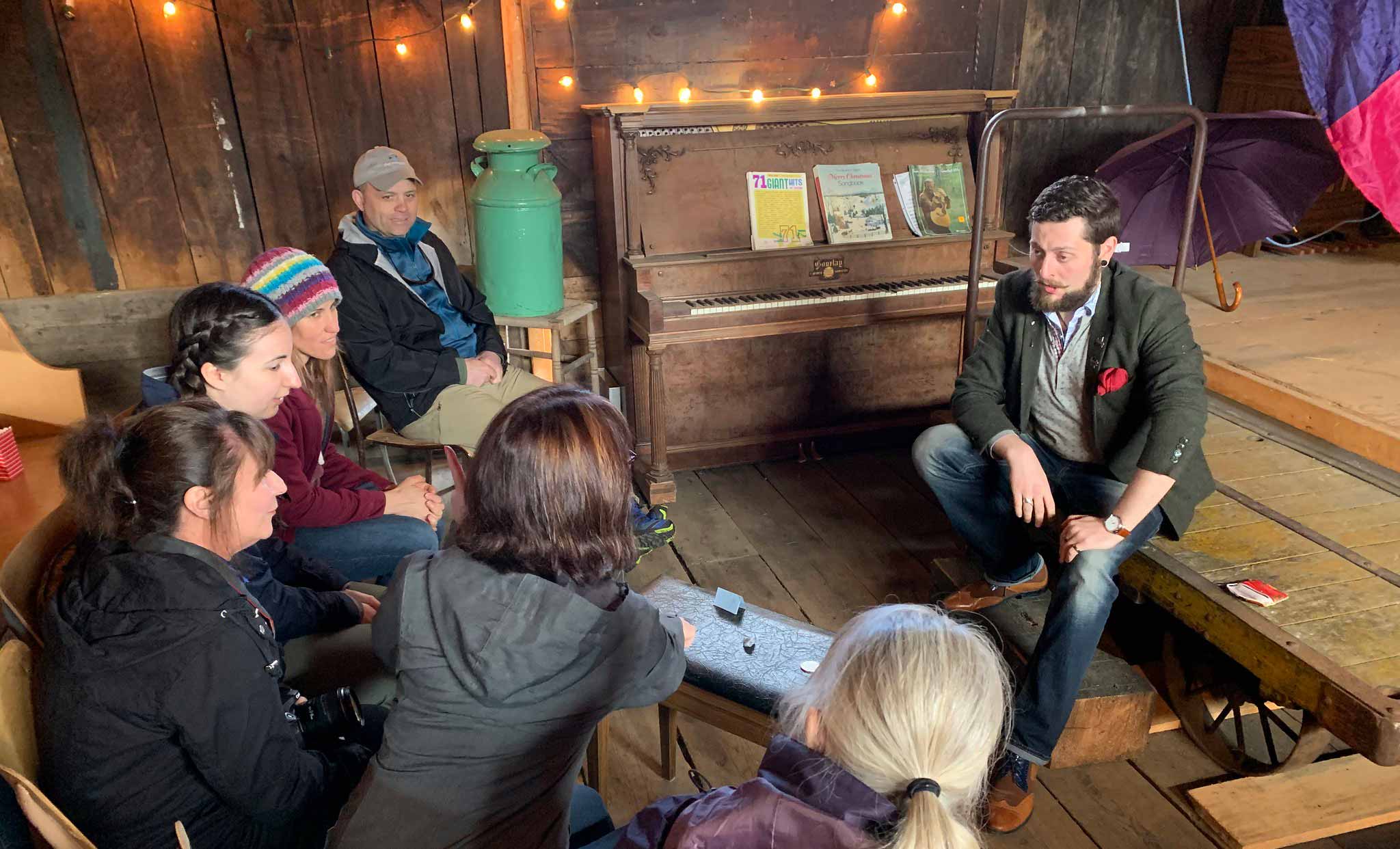 Ontario community musician talking with friends