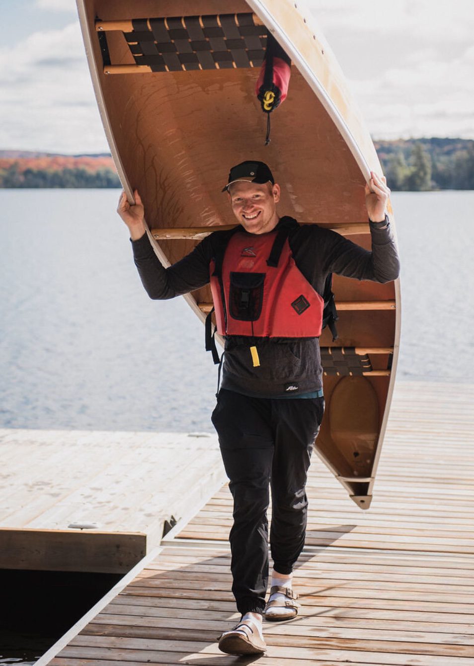 Tim carrying a Canoe